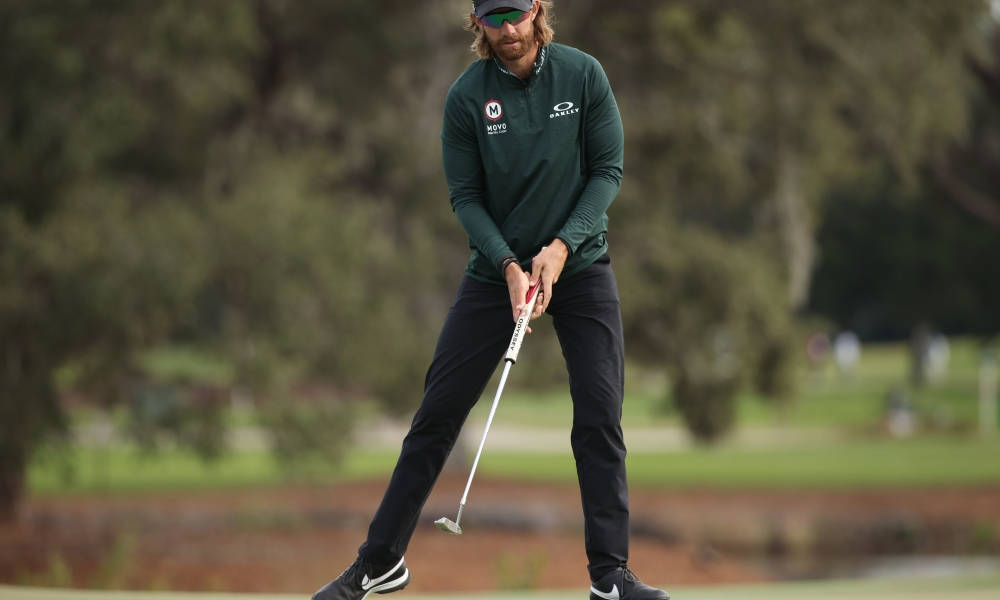 Patrick Rodgers Pondering His Next Shot On The Golf Course Background