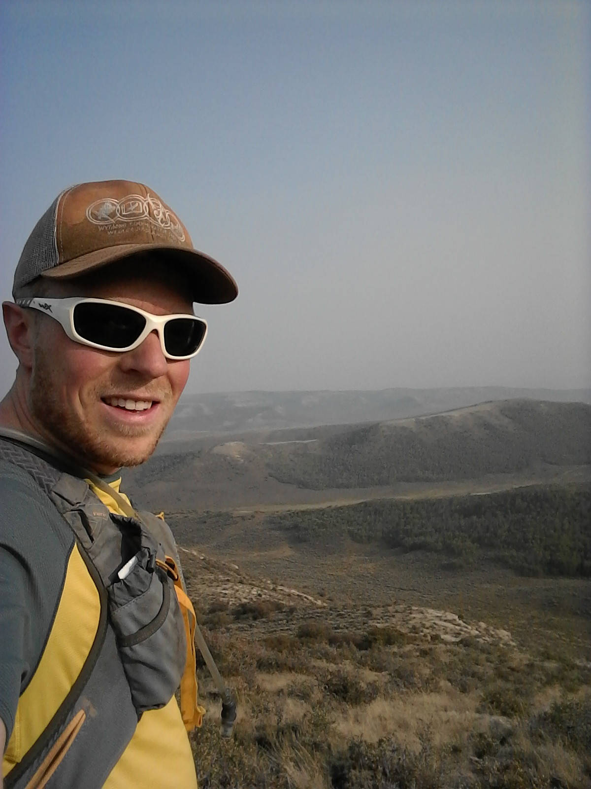 Patrick Rodgers Selfie On Top Mountain Background