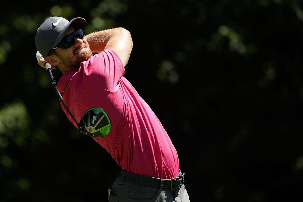 Patrick Rodgers Unwinding With A Focused Golf Swing Background