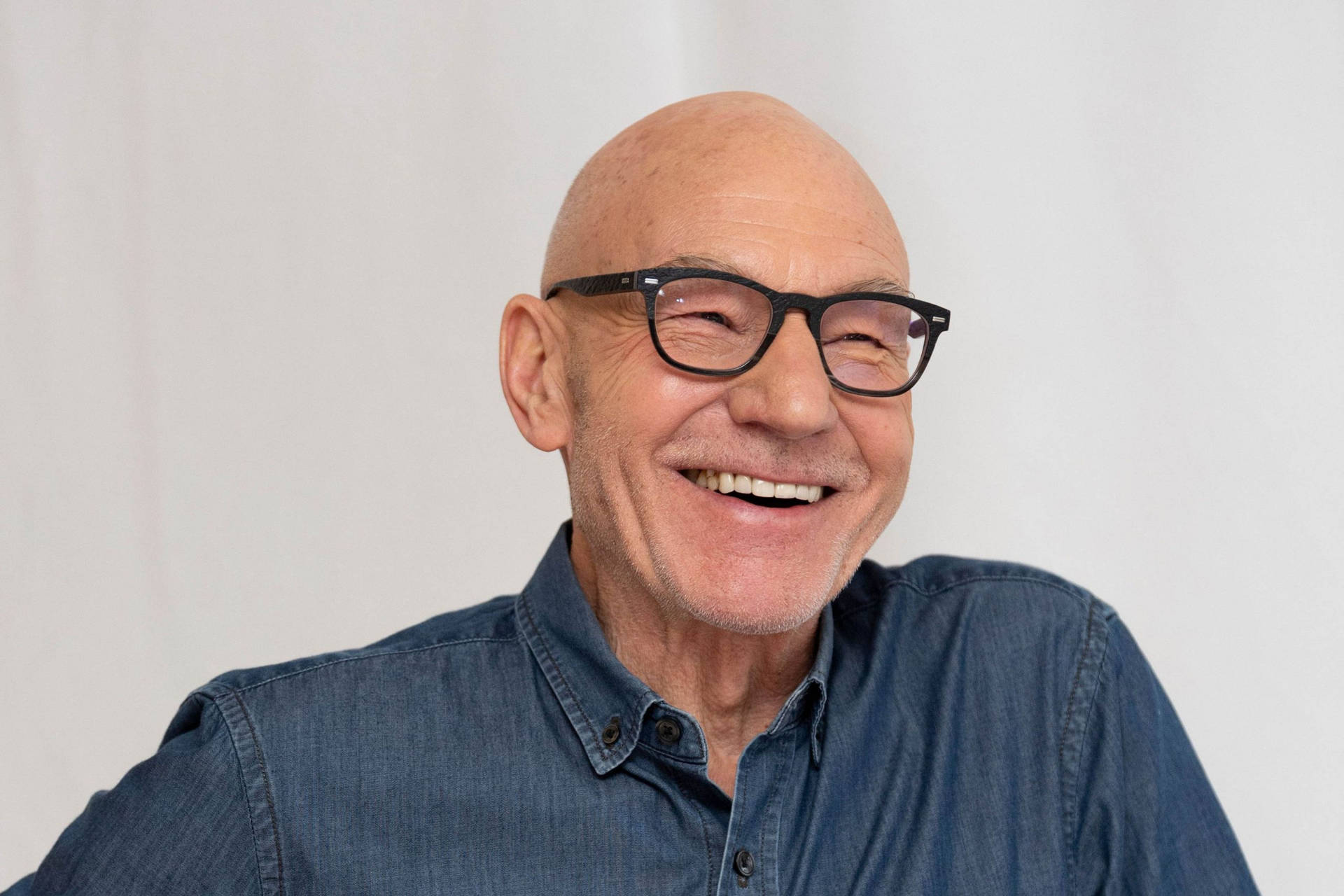 Patrick Stewart Denim Top Background