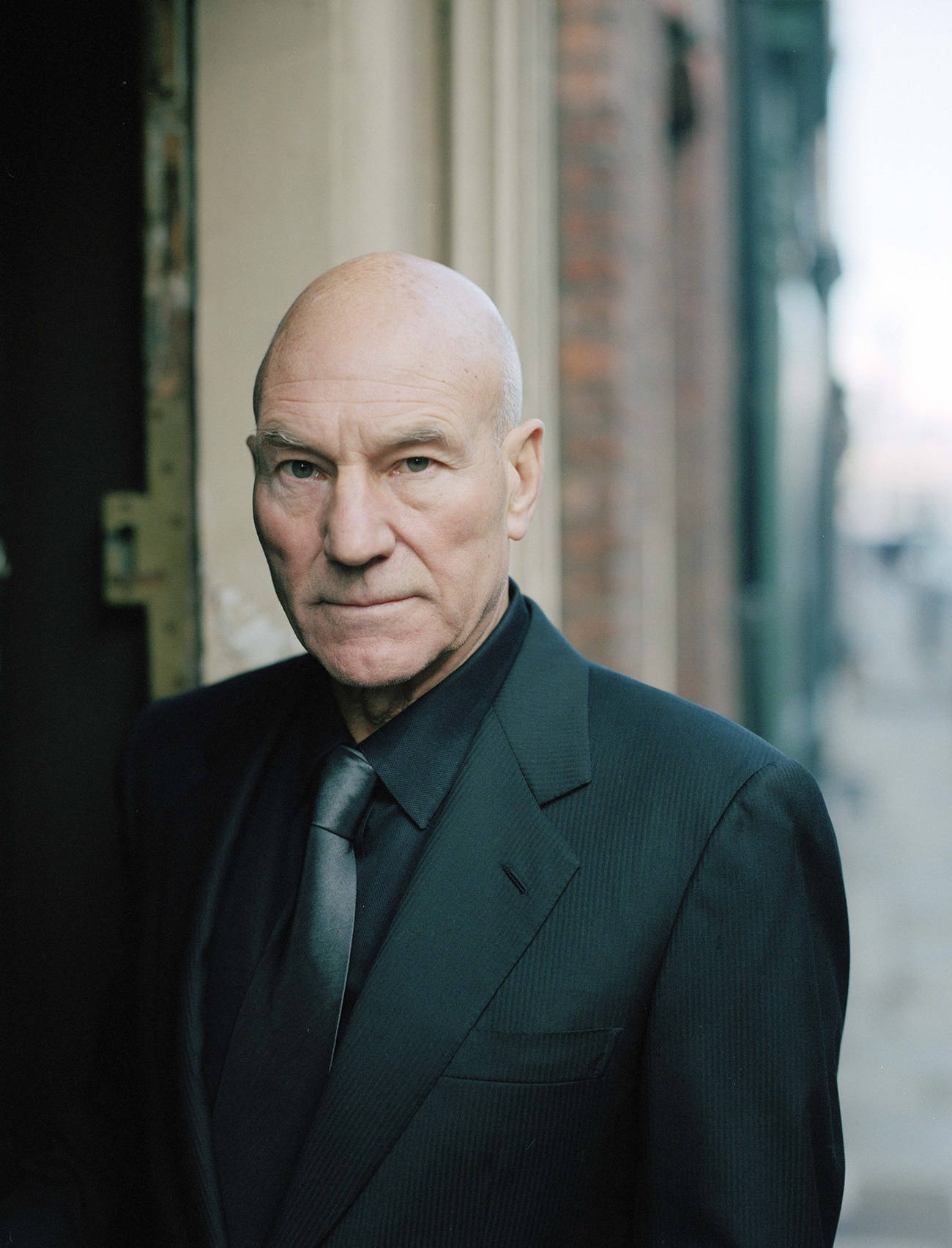 Patrick Stewart Formal Suit And Tie Background