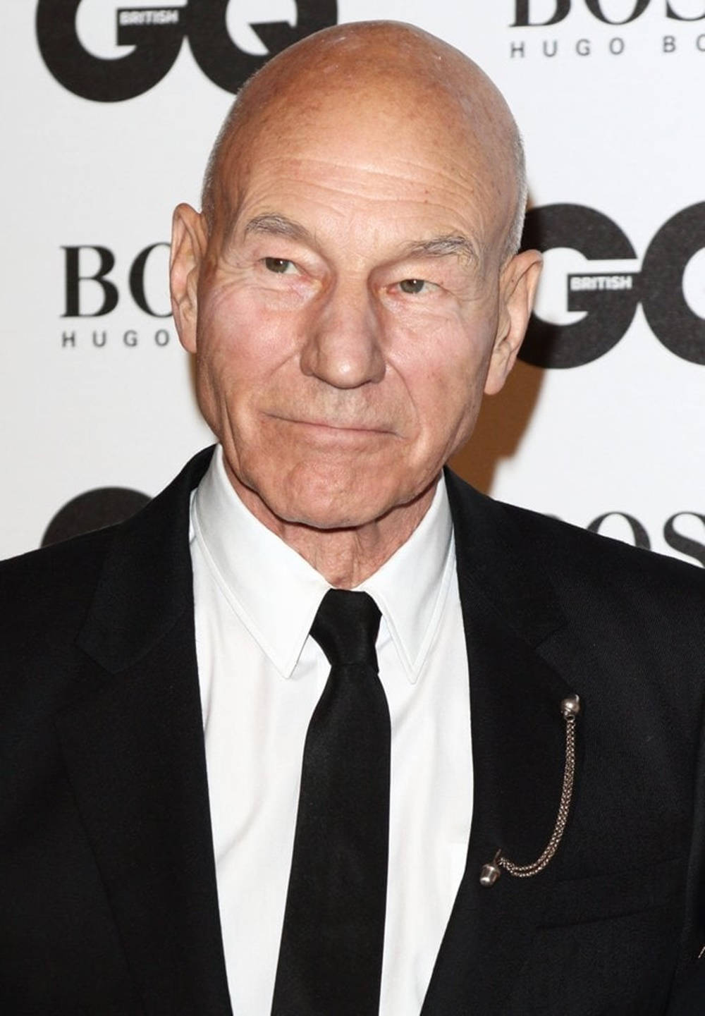 Patrick Stewart Neat And Chipper Suit Background