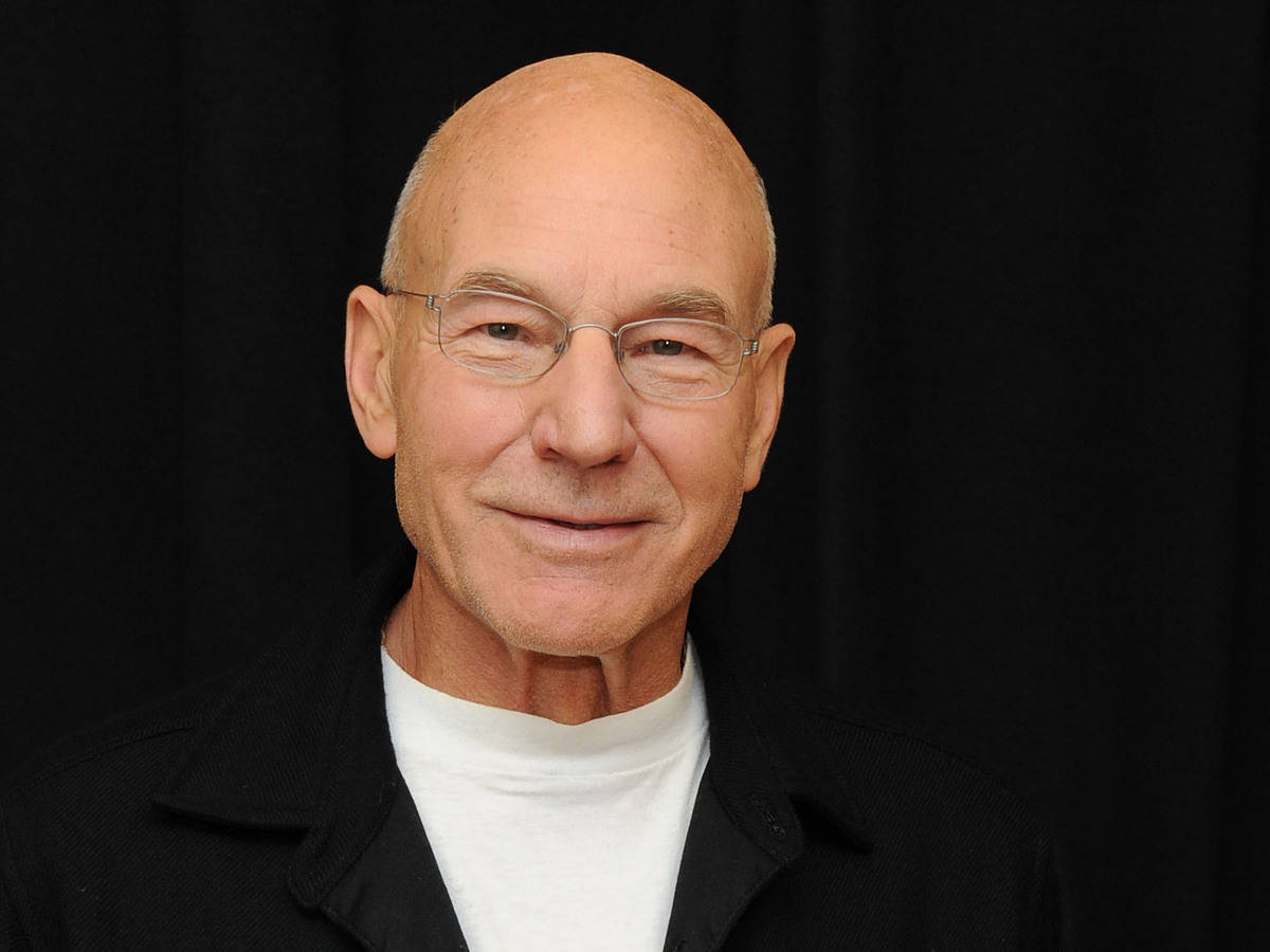 Patrick Stewart On A Black Backdrop Background