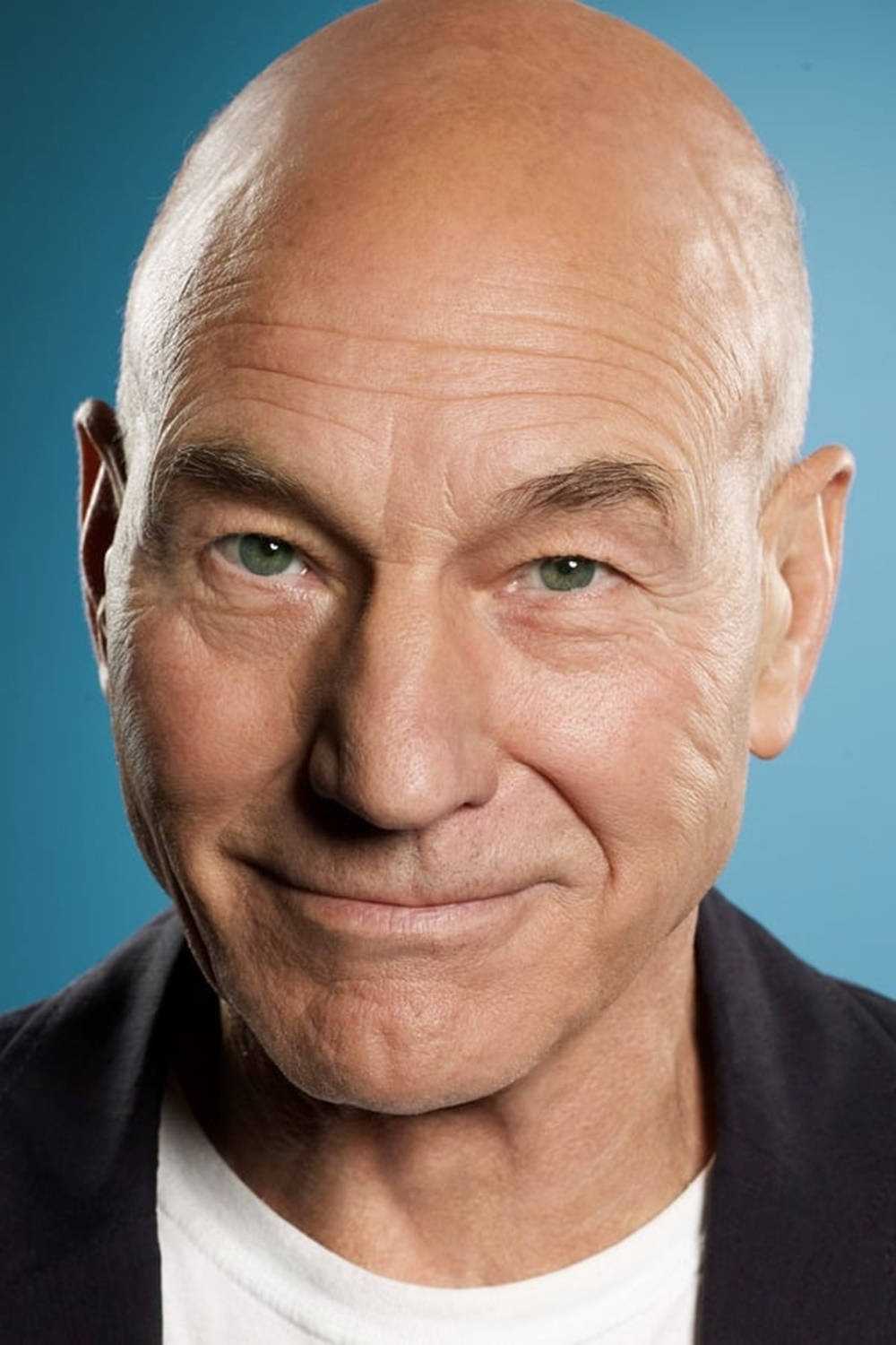 Patrick Stewart Smiling With Closed Lips Background