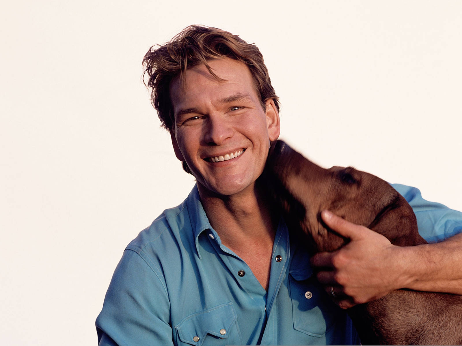 Patrick Swayze American Actor With His Dog Background