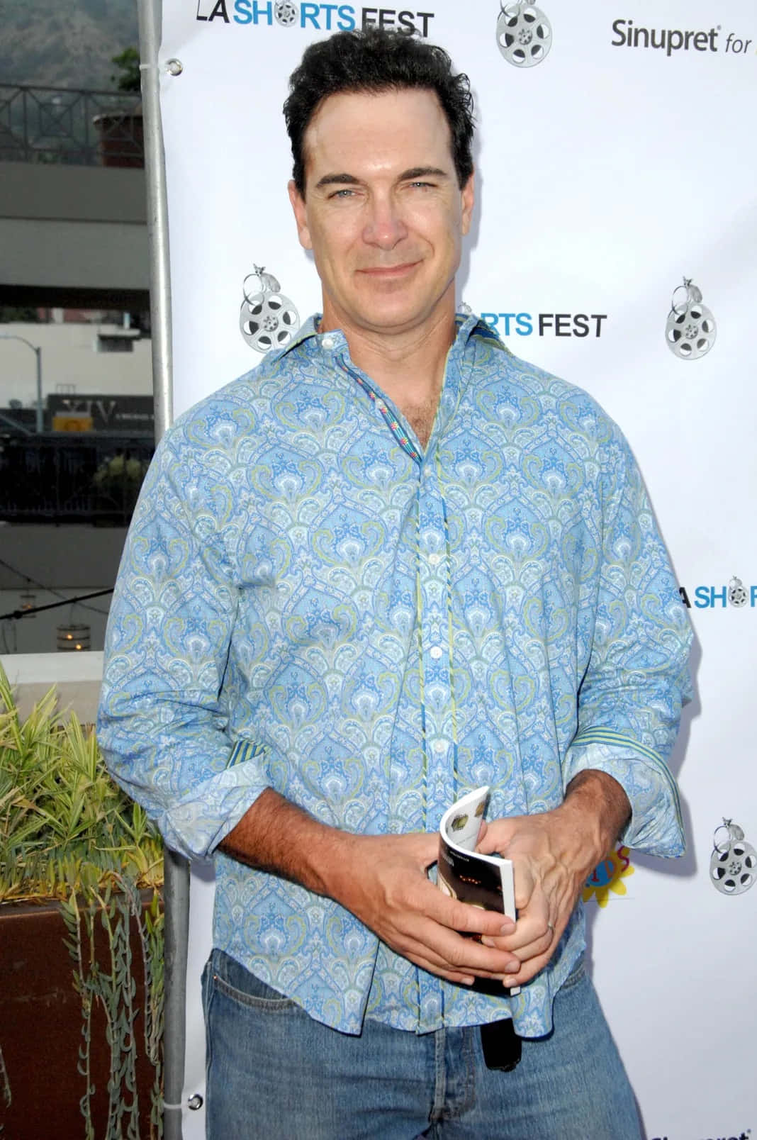 Patrick Warburton In Black And White Background