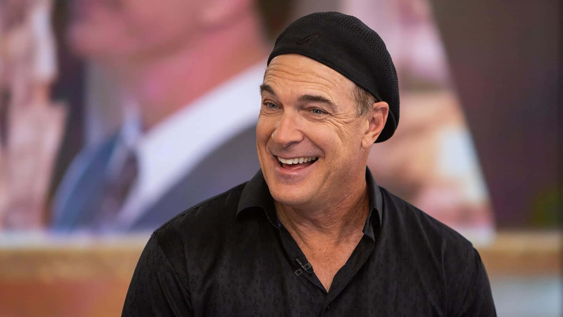 Patrick Warburton Looking Smart In A Tailored Suit Background