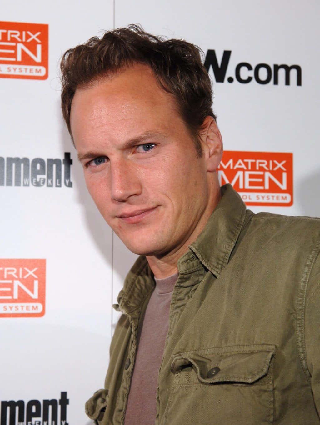 Patrick Wilson In A Stylish Blue Suit Background