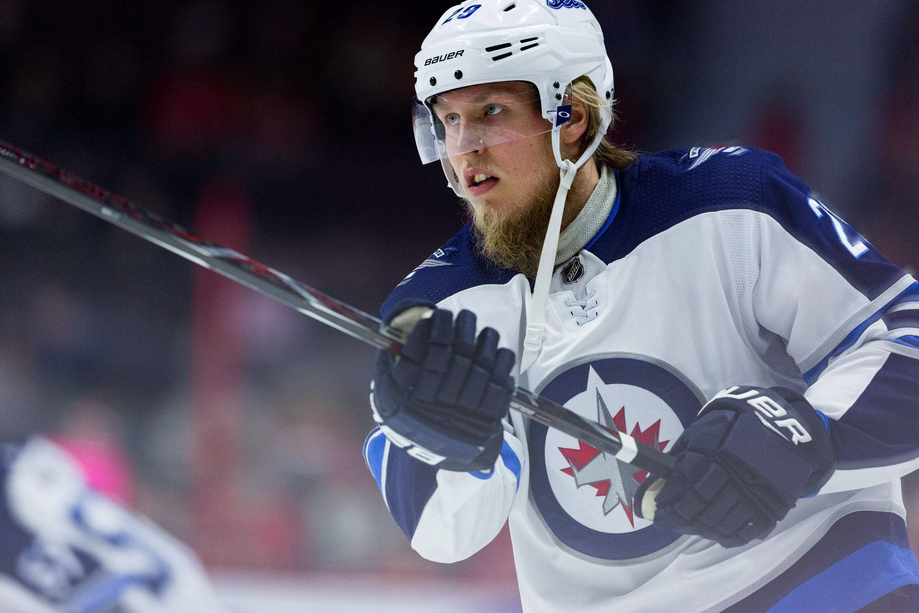 Patrik Laine In Action, A Close-up Shot On The Ice.