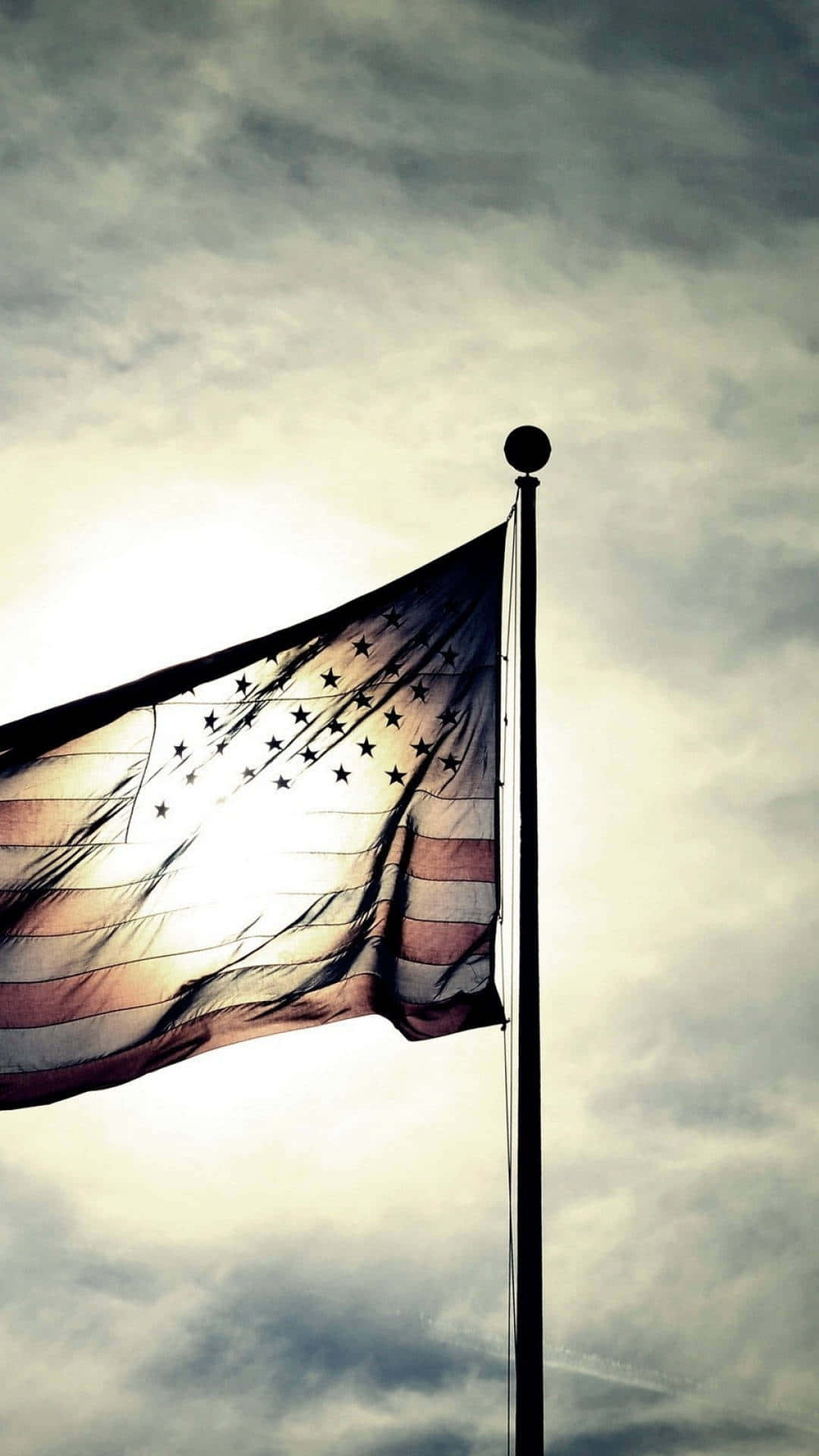 Patriotic_ Flag_ Backlit_ Sky