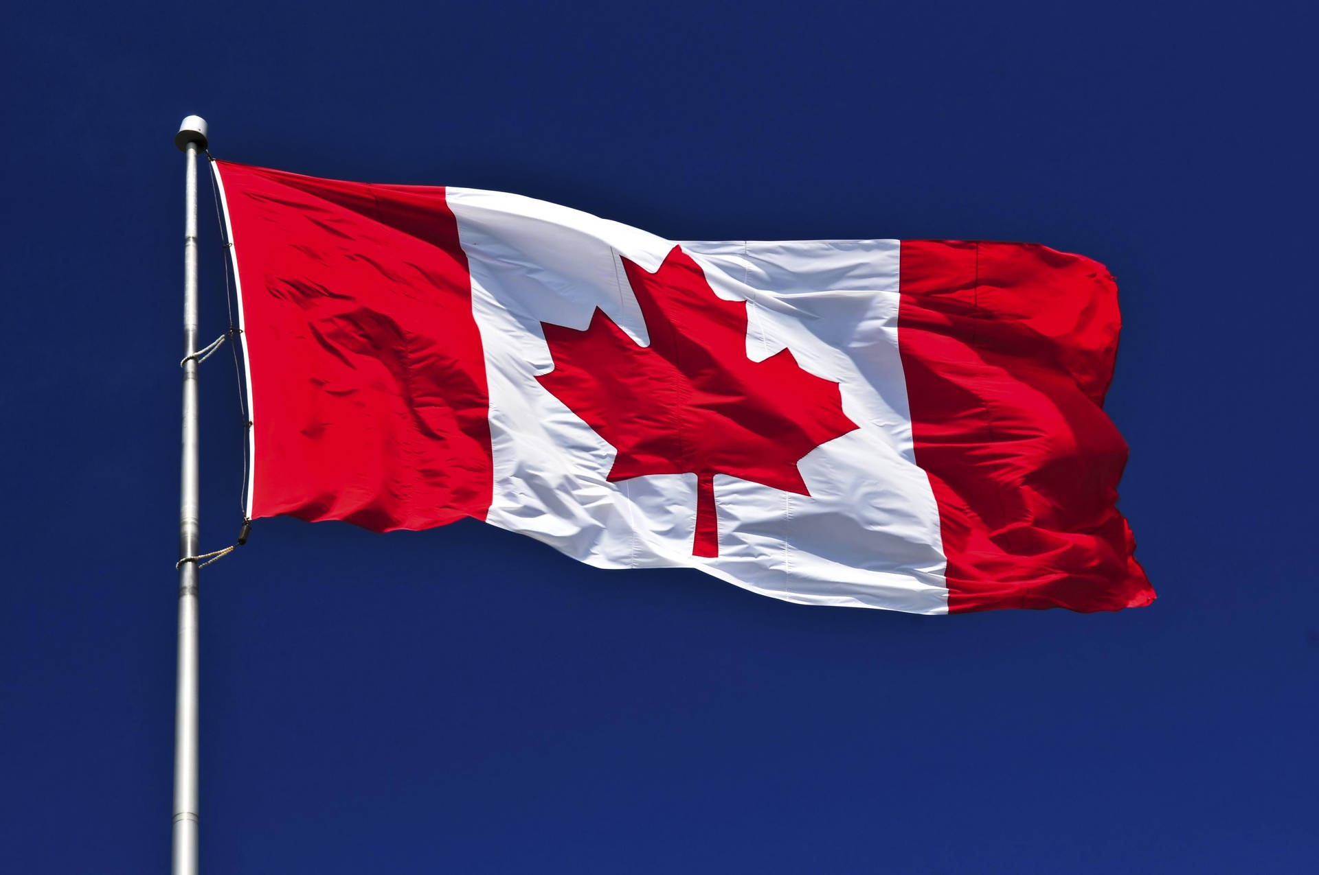 Patriotic Resilience - The Vibrant Flag Of Canada Background