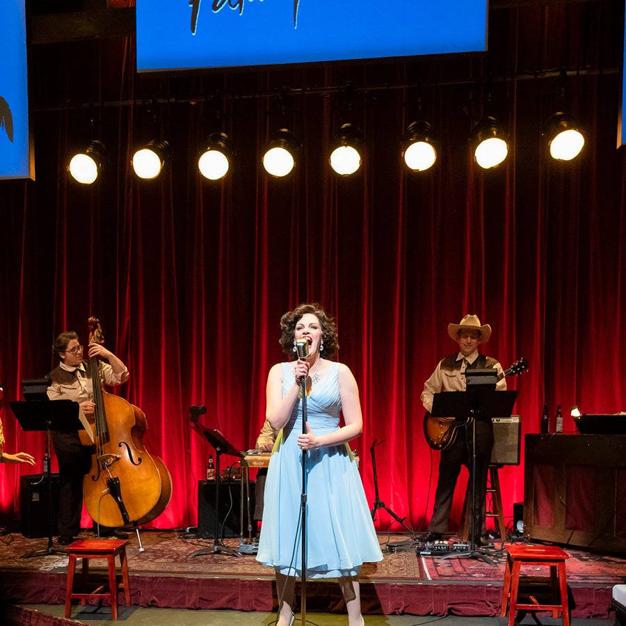 Patsy Cline Singing On Stage Background