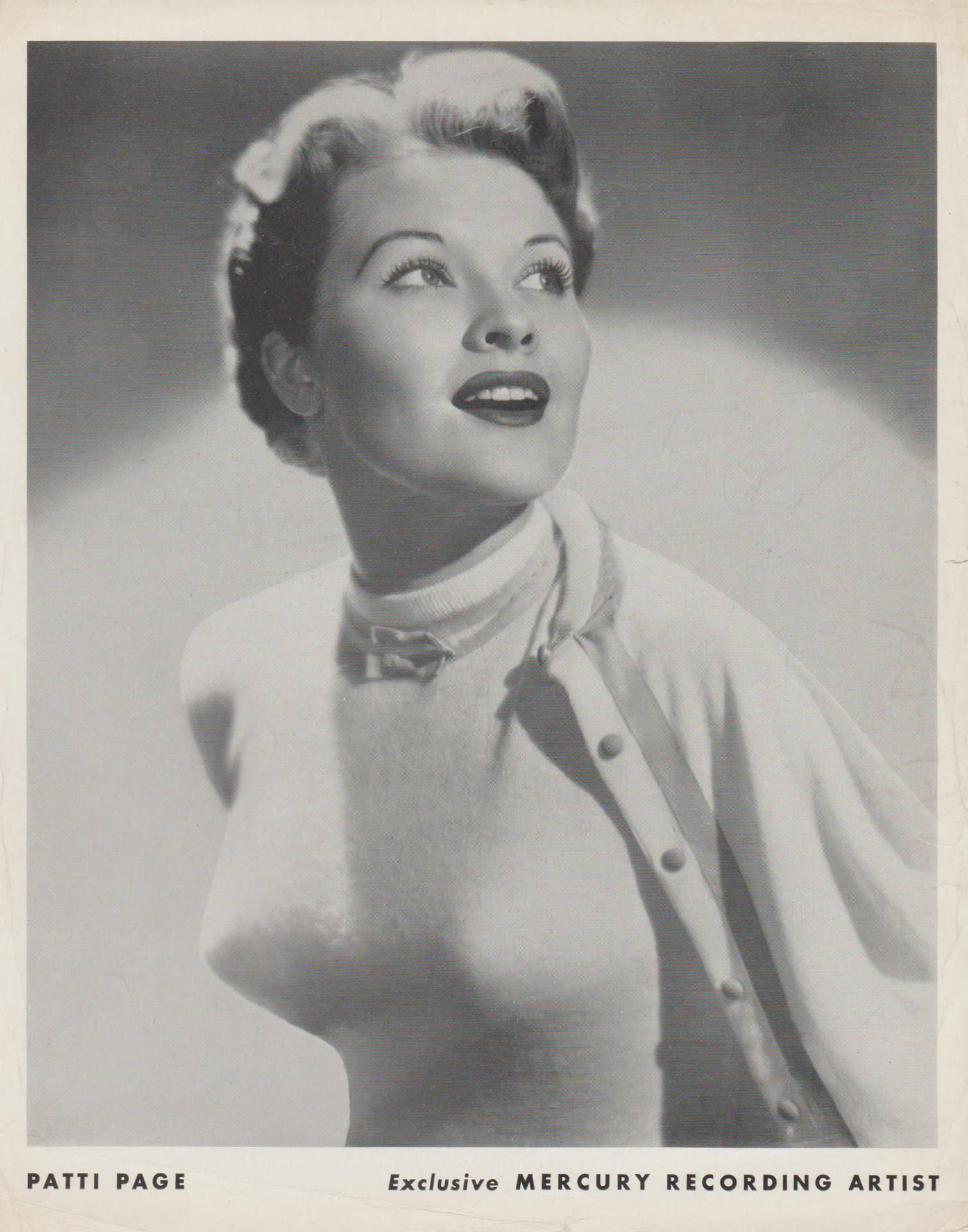 Patti Page Bullet Bra Background