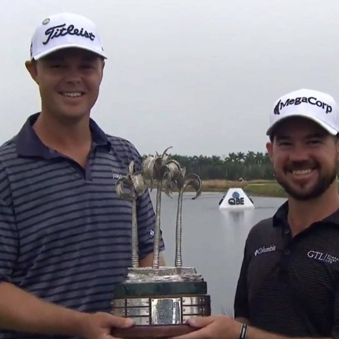 Patton Kizzire Holding A Trophy