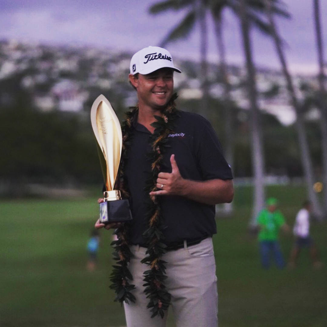 Patton Kizzire Holding His Trophy