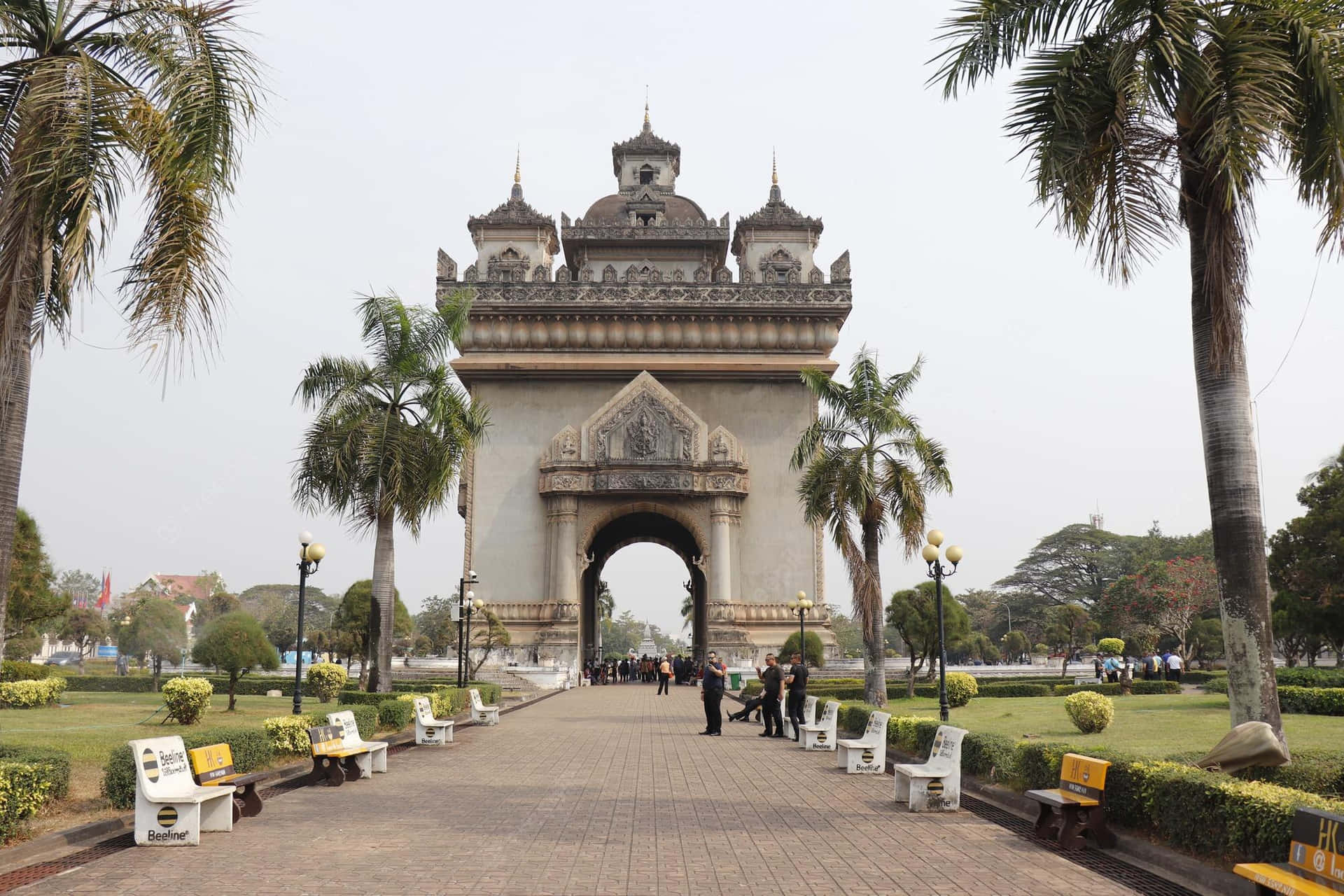 Patuxai Monument At Daytime In Vientiane Background