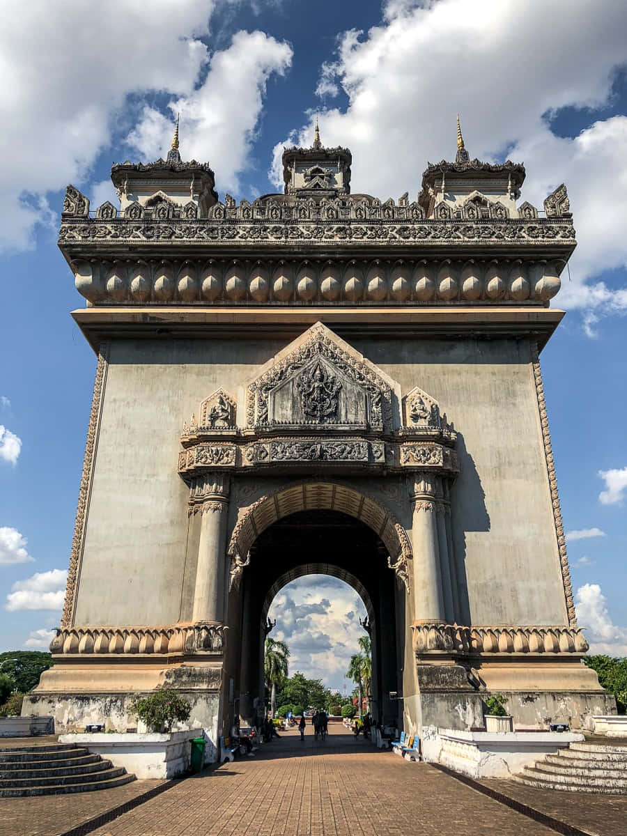 Patuxai Monument With Cloudy Sky Background