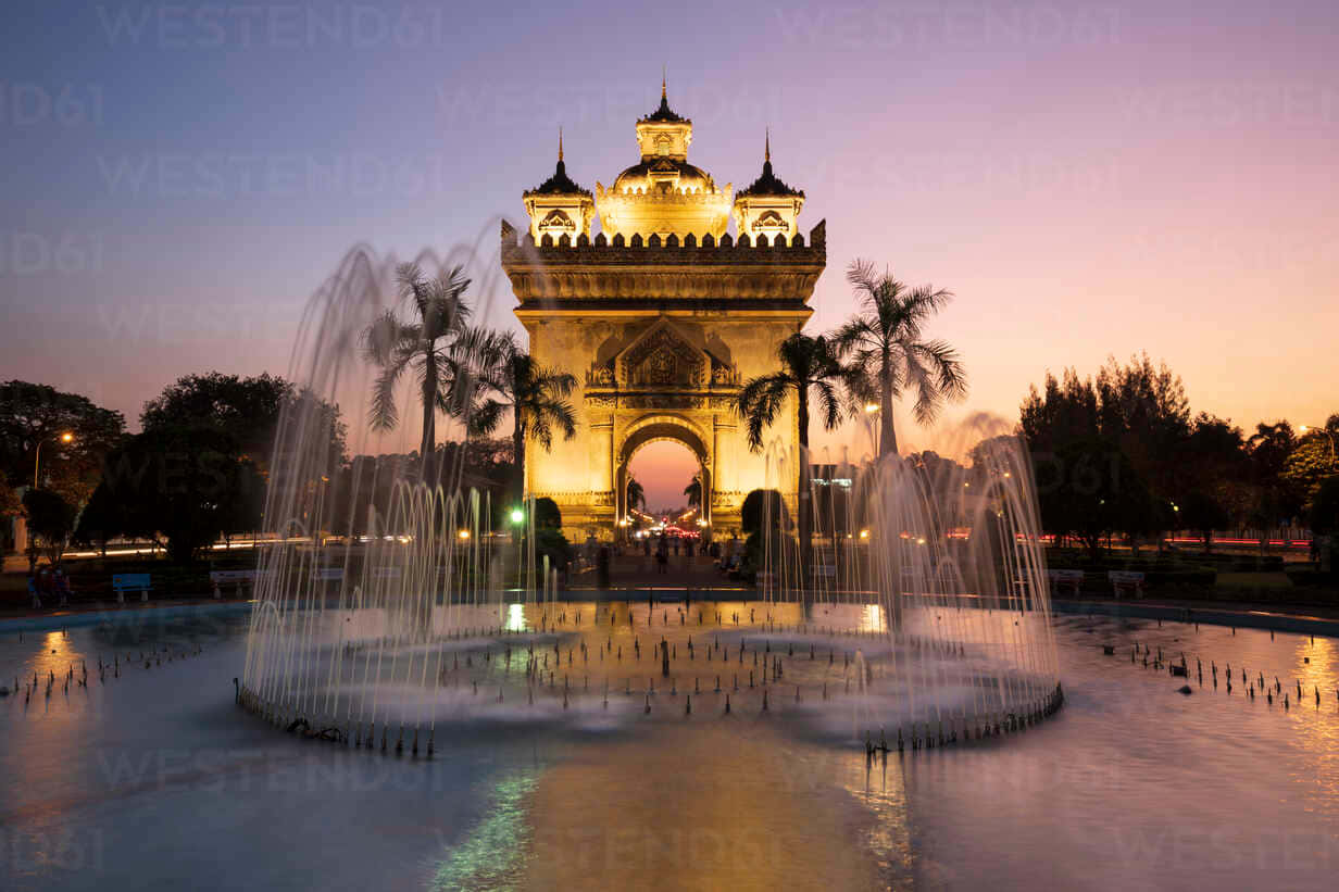 Patuxai War Monument At Sundown Background