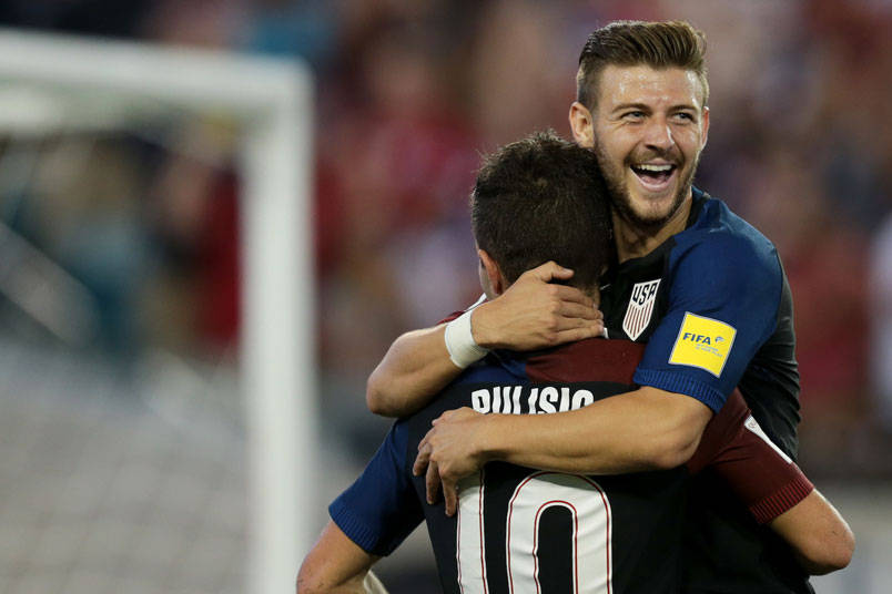 Paul Arriola Hugs Christian Pulisic