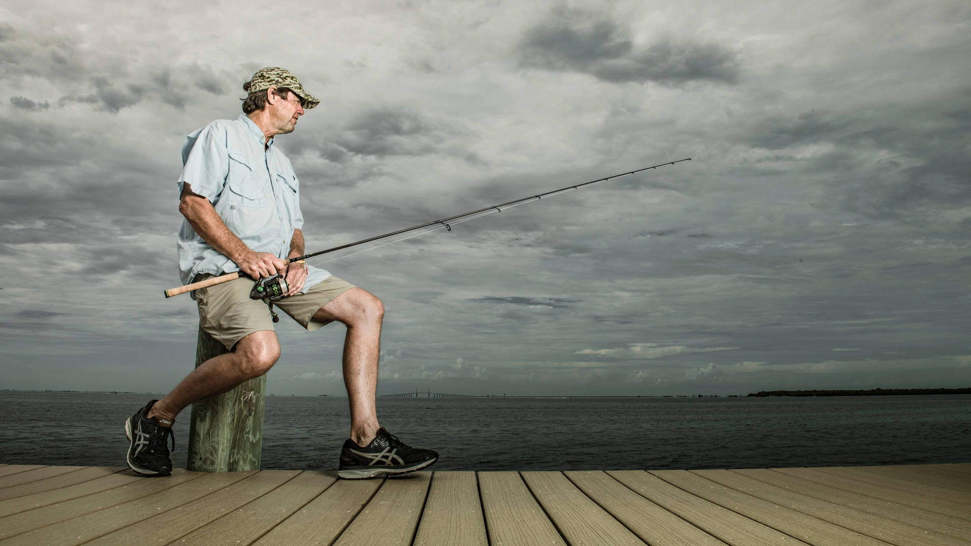 Paul Azinger Holding Fishing Rod Background