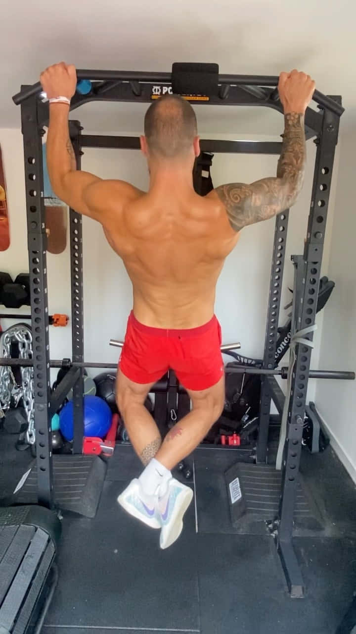 Paul Craig Doing Chin-ups Background