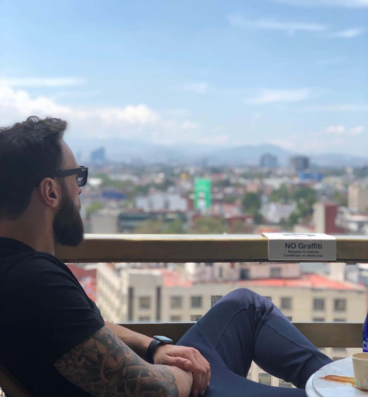 Paul Craig Relaxing On Balcony