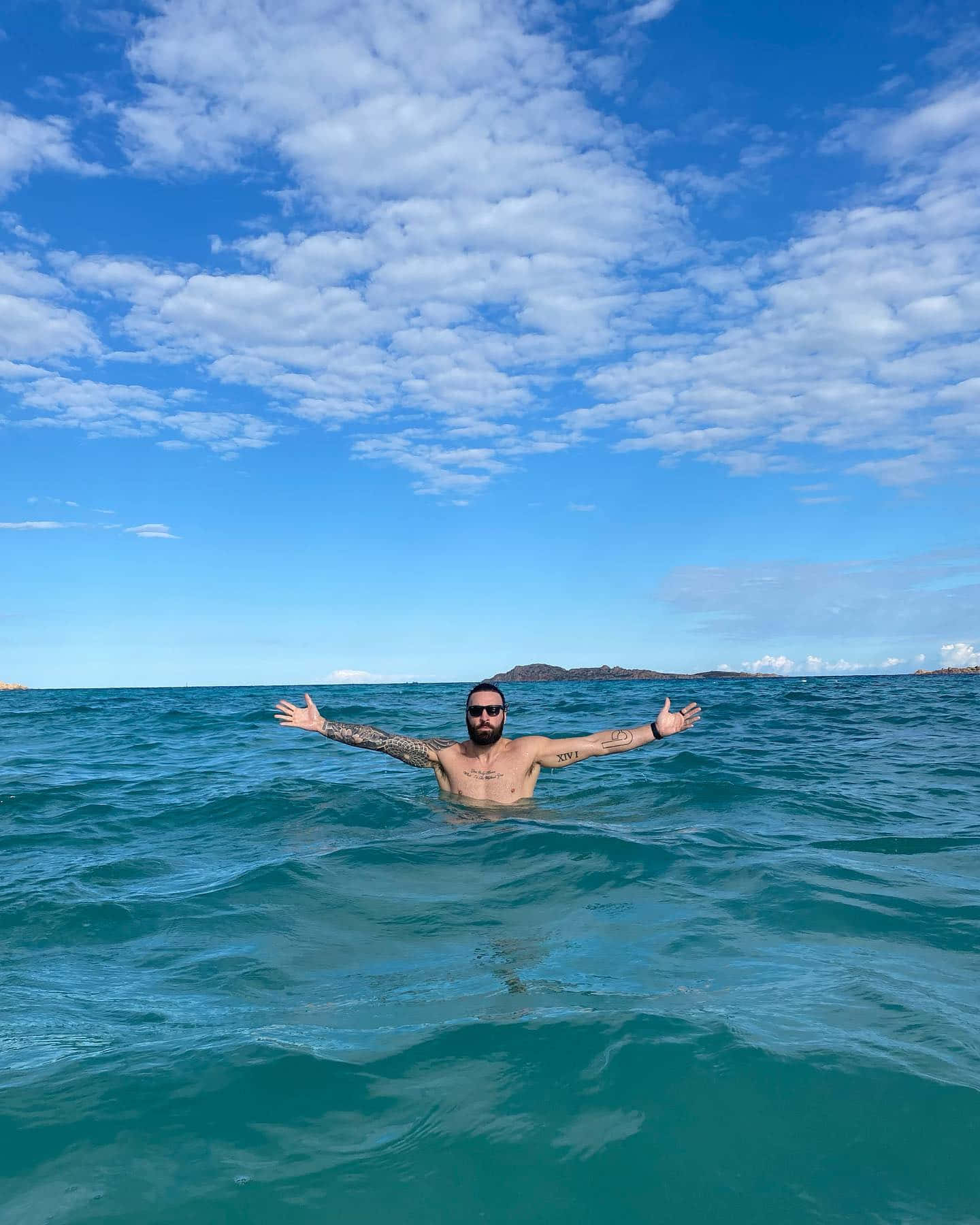 Paul Craig Swimming In Sea Background