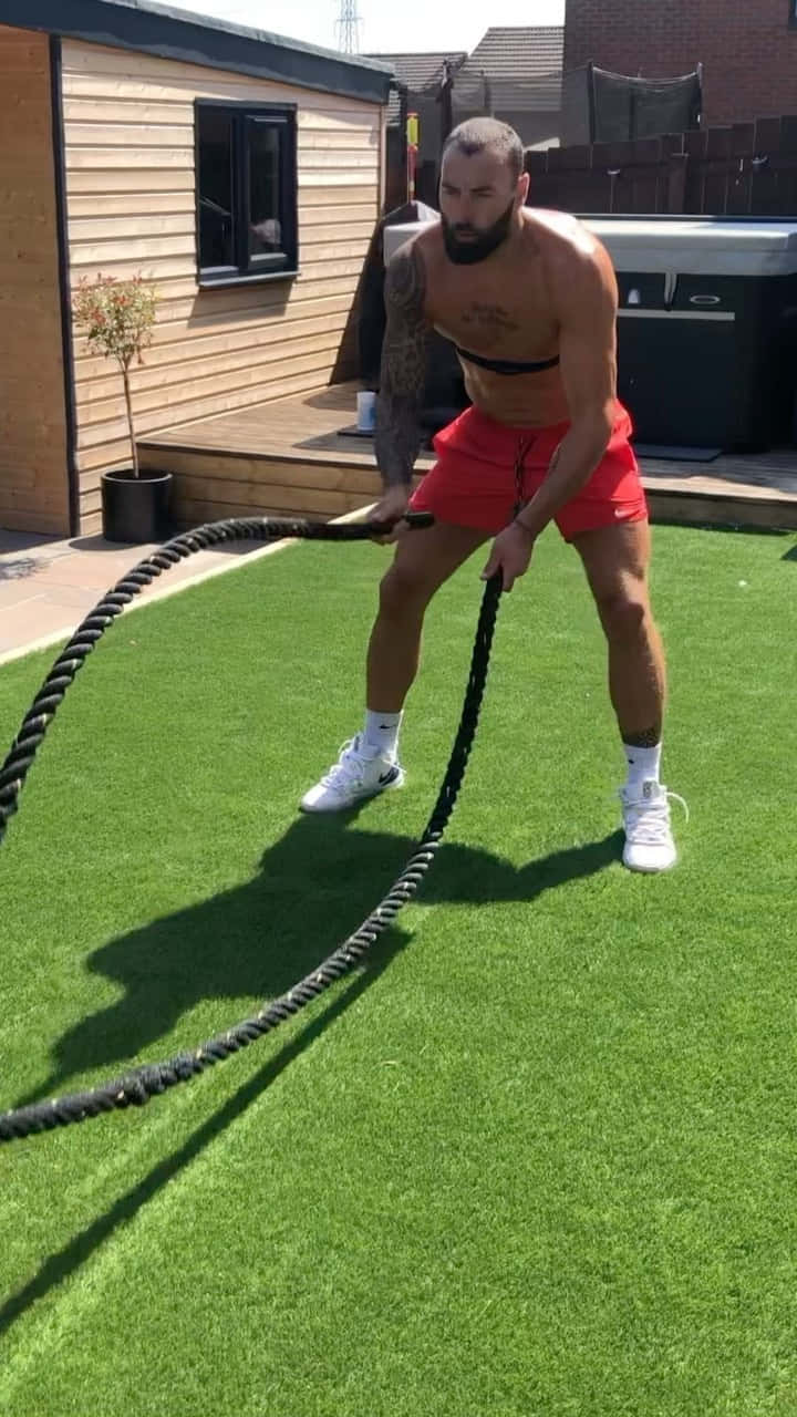 Paul Craig With Training Ropes Background