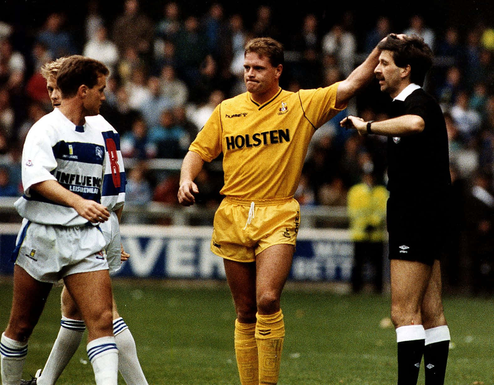 Paul Gascoigne In Action In Yellow Uniform Background