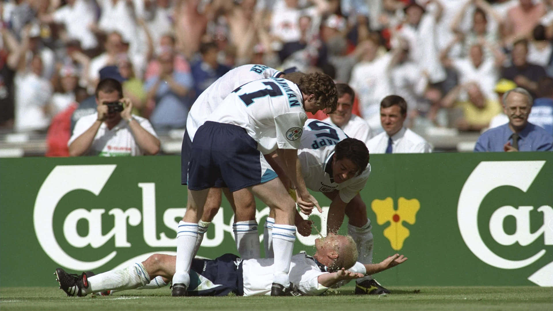 Paul Gascoigne On The Ground Background