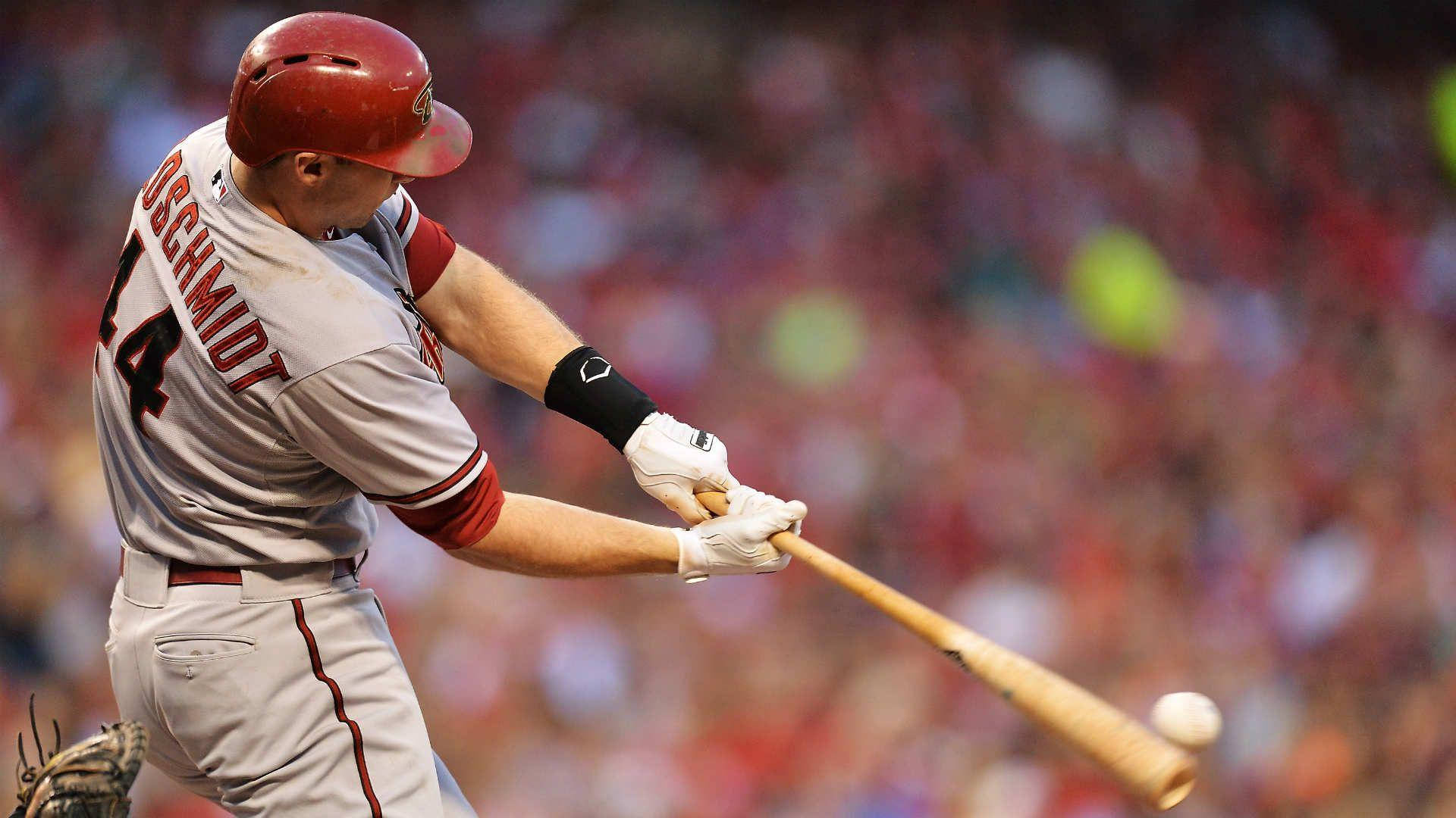 Paul Goldschmidt Hitting Baseball Background