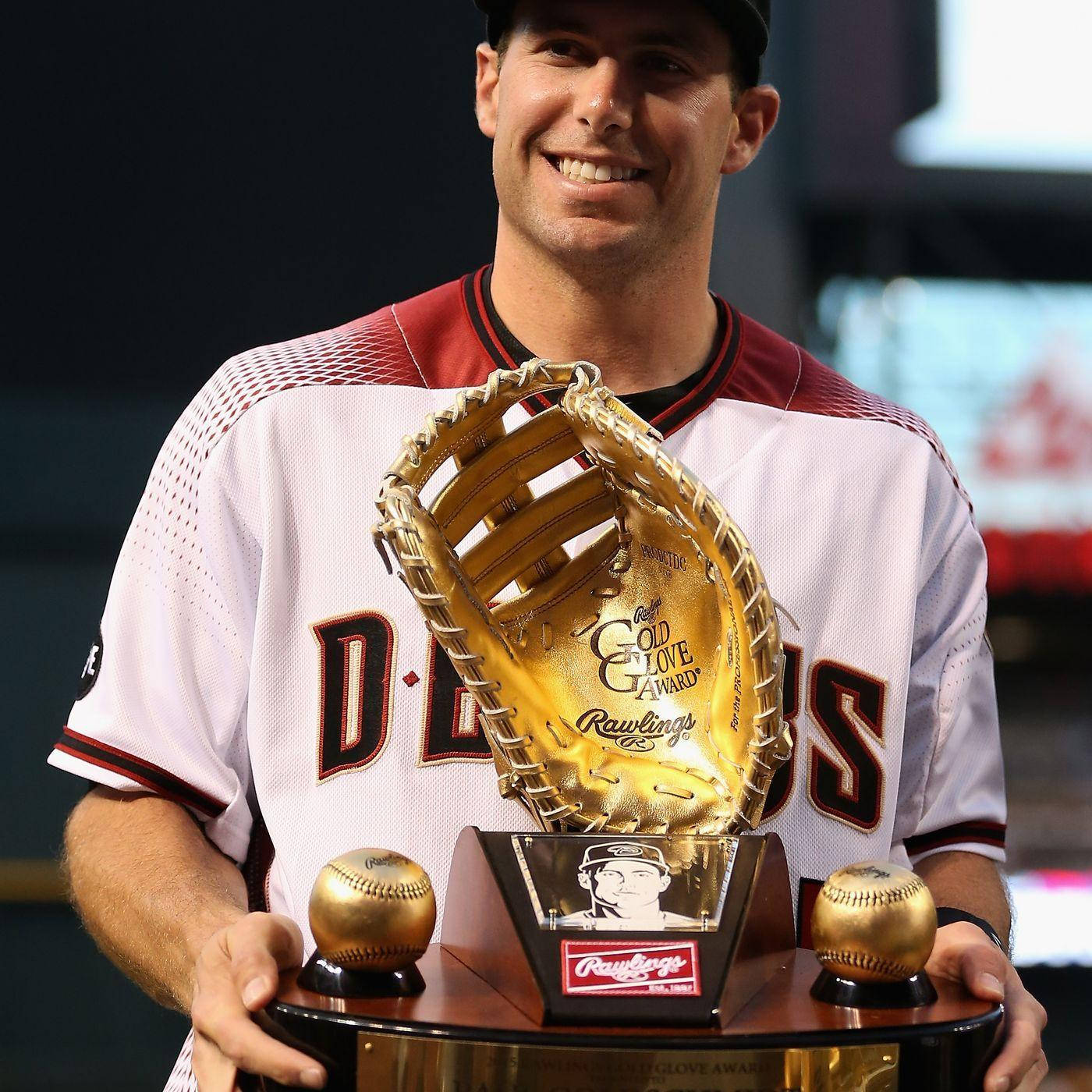 Paul Goldschmidt Proudly Holding His Gold Glove Award Background