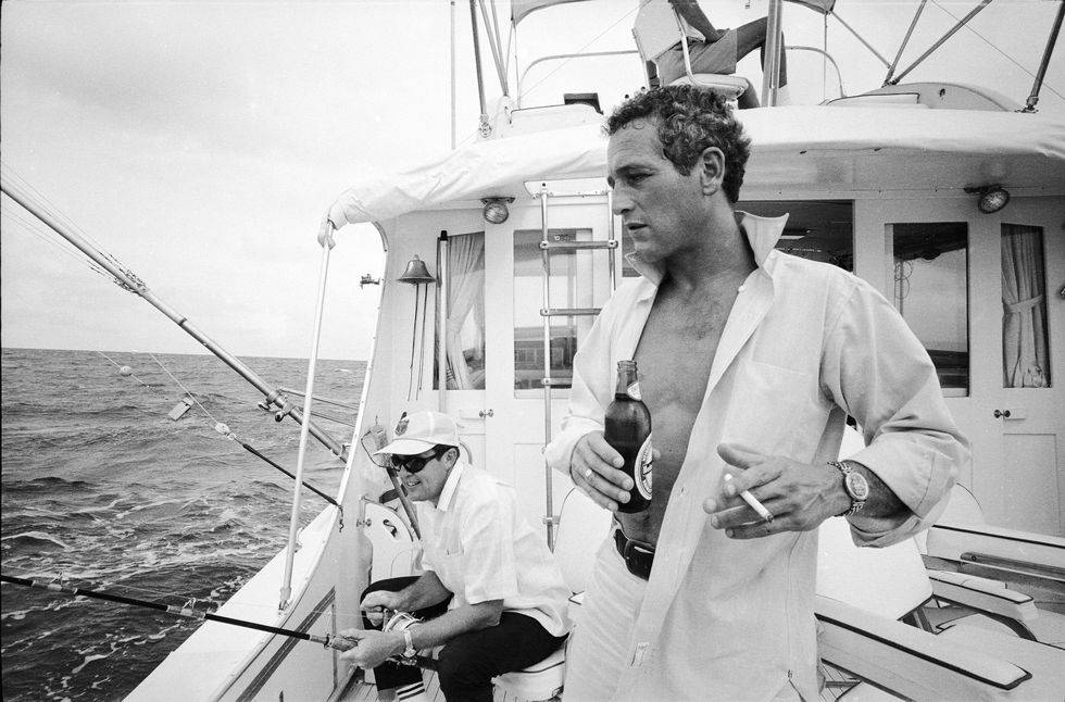 Paul Newman On A Yacht Background