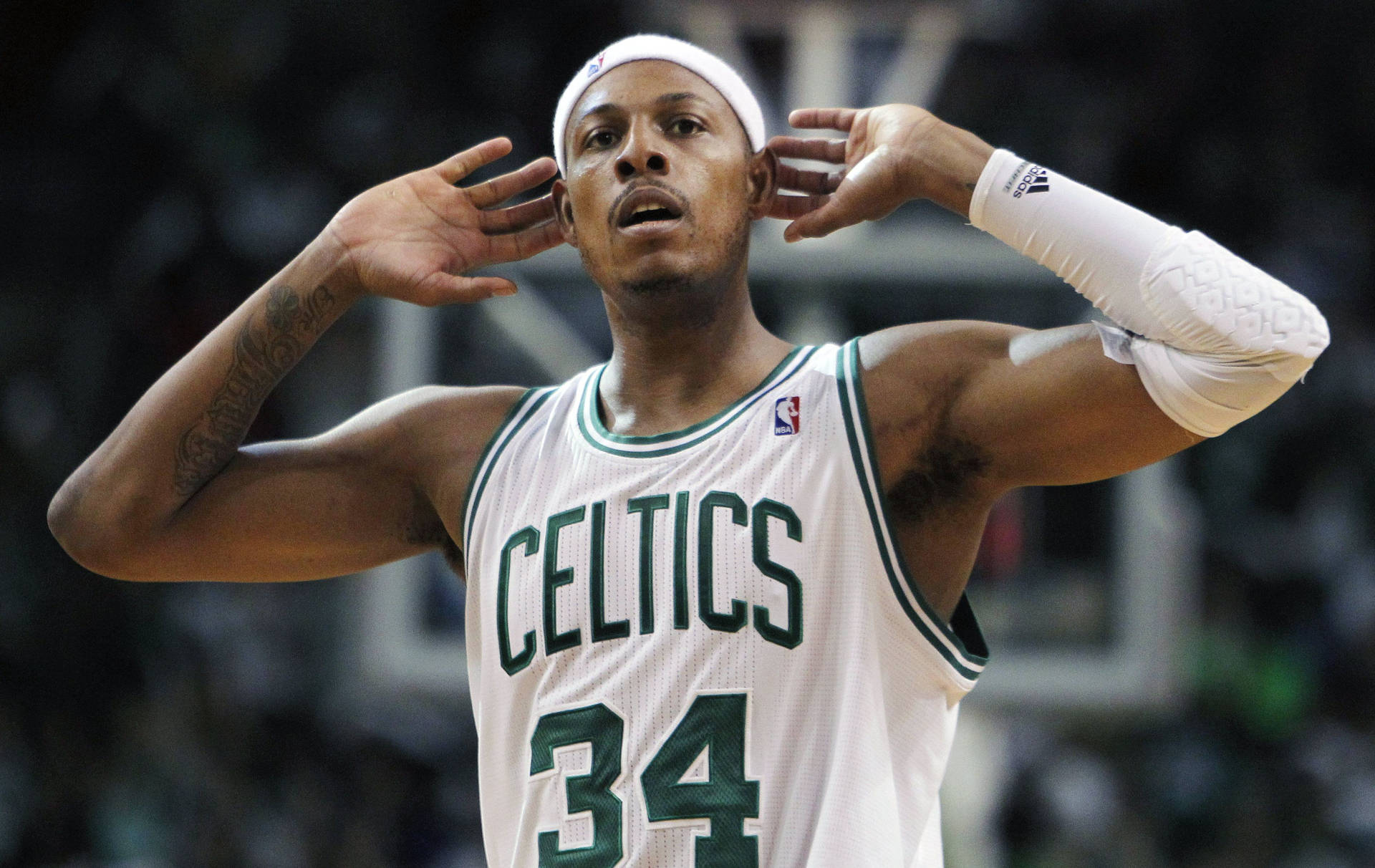 Paul Pierce With Hands On Ears Background