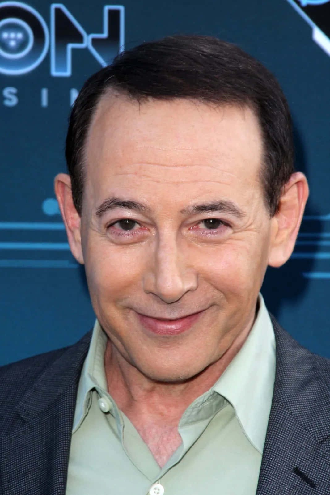 Paul Reubens Wearing A Vintage Striped Shirt Background