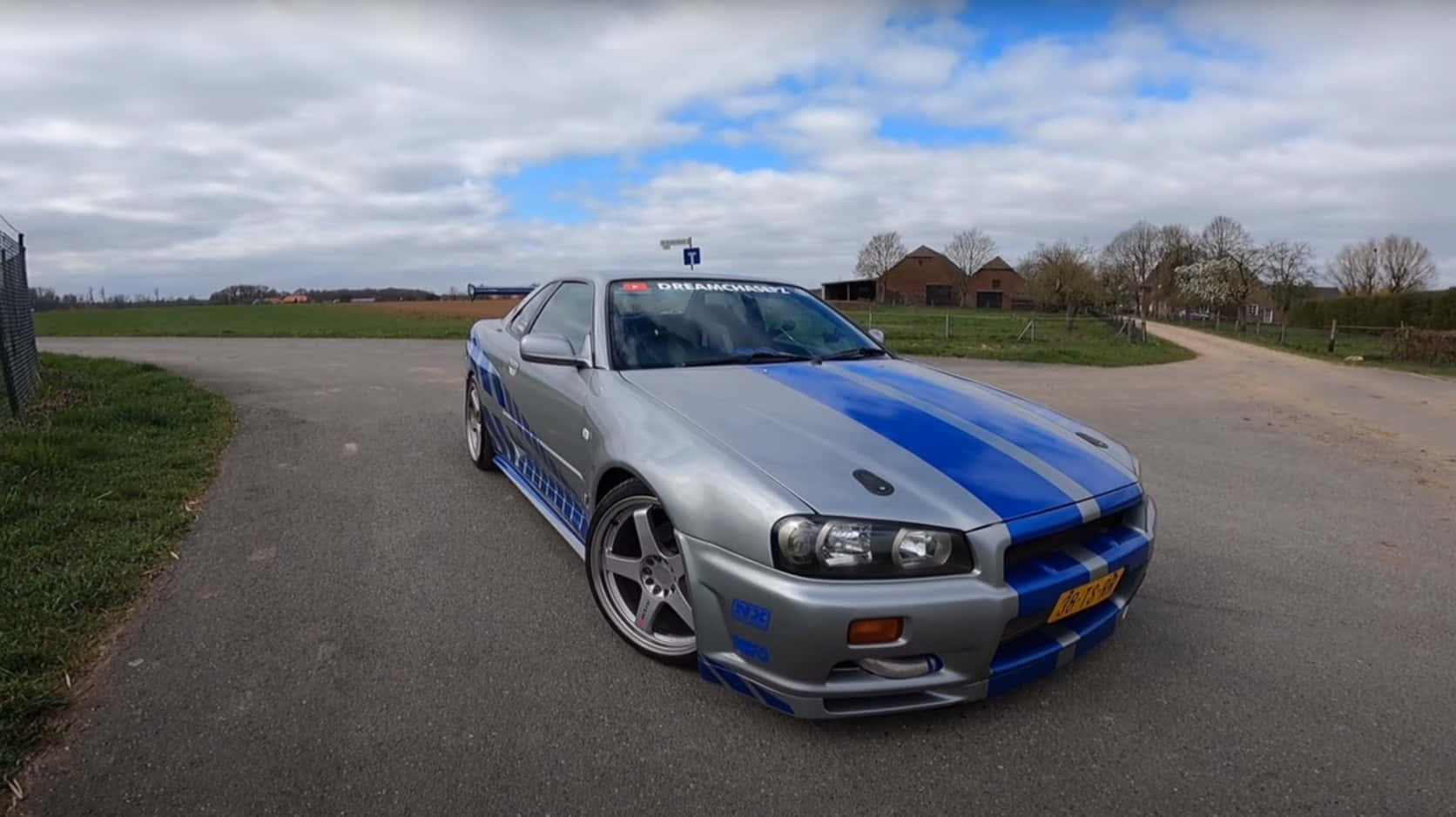 Paul Walker Drifts Through Downtown In A Nissan Skyline. Background