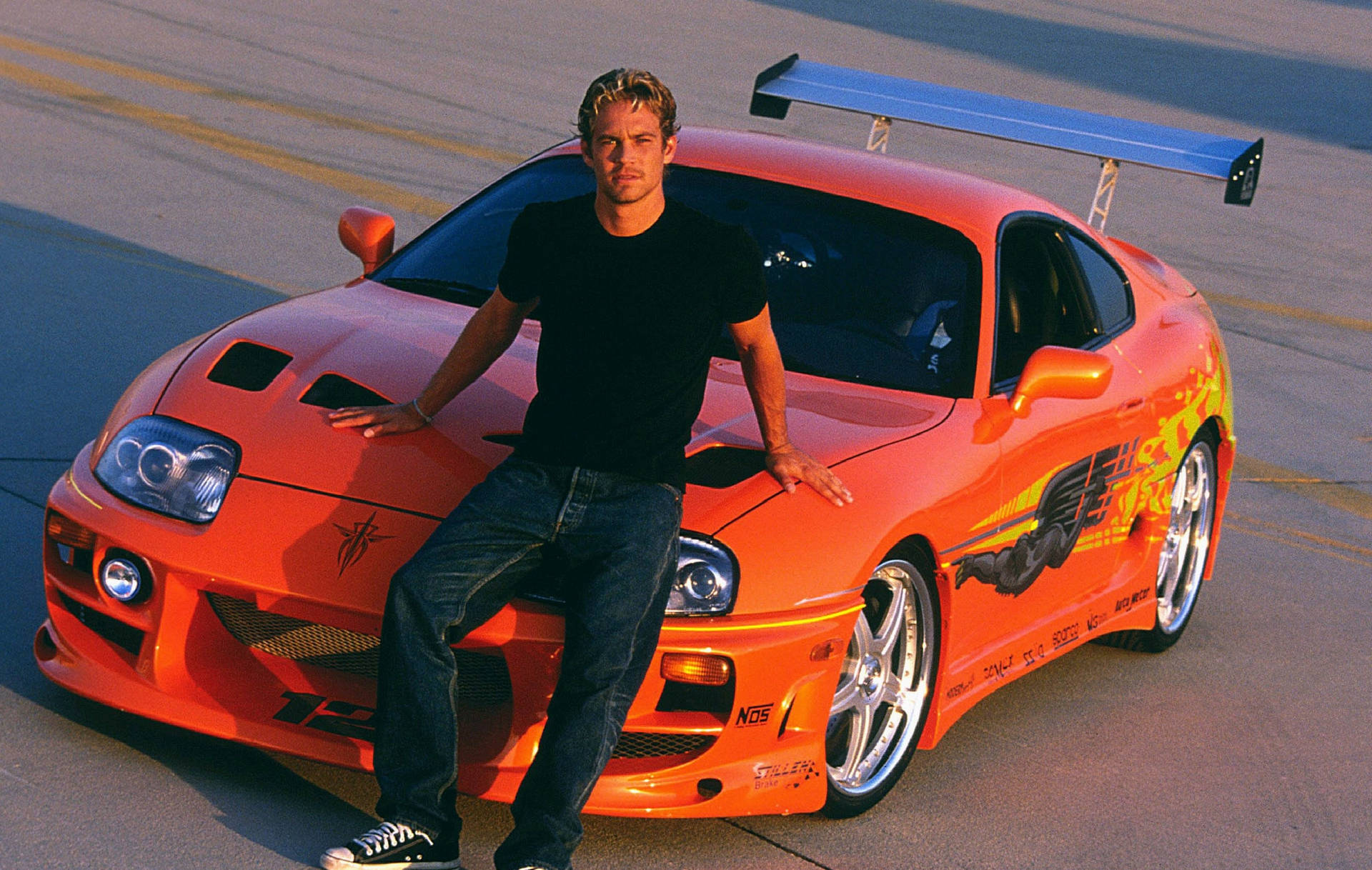 Paul Walker Driving His Custom Muscle Car Background