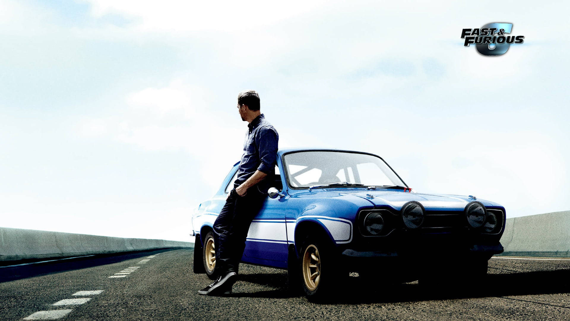 Paul Walker Leaning On A Blue Car Background
