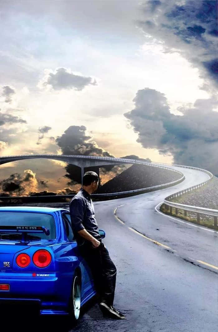 Paul Walker Speeding Through The Night In His Nissan Skyline Background