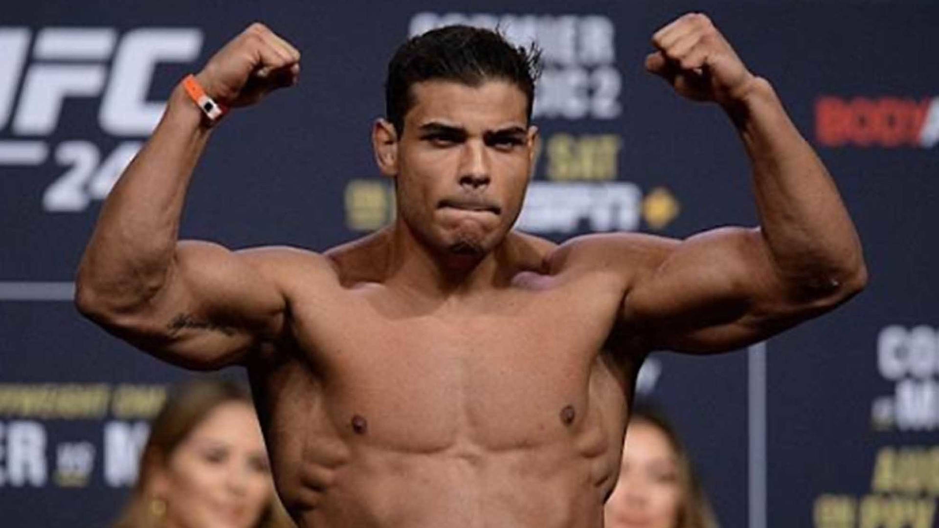 Paulo Costa Posing With Smirk Background