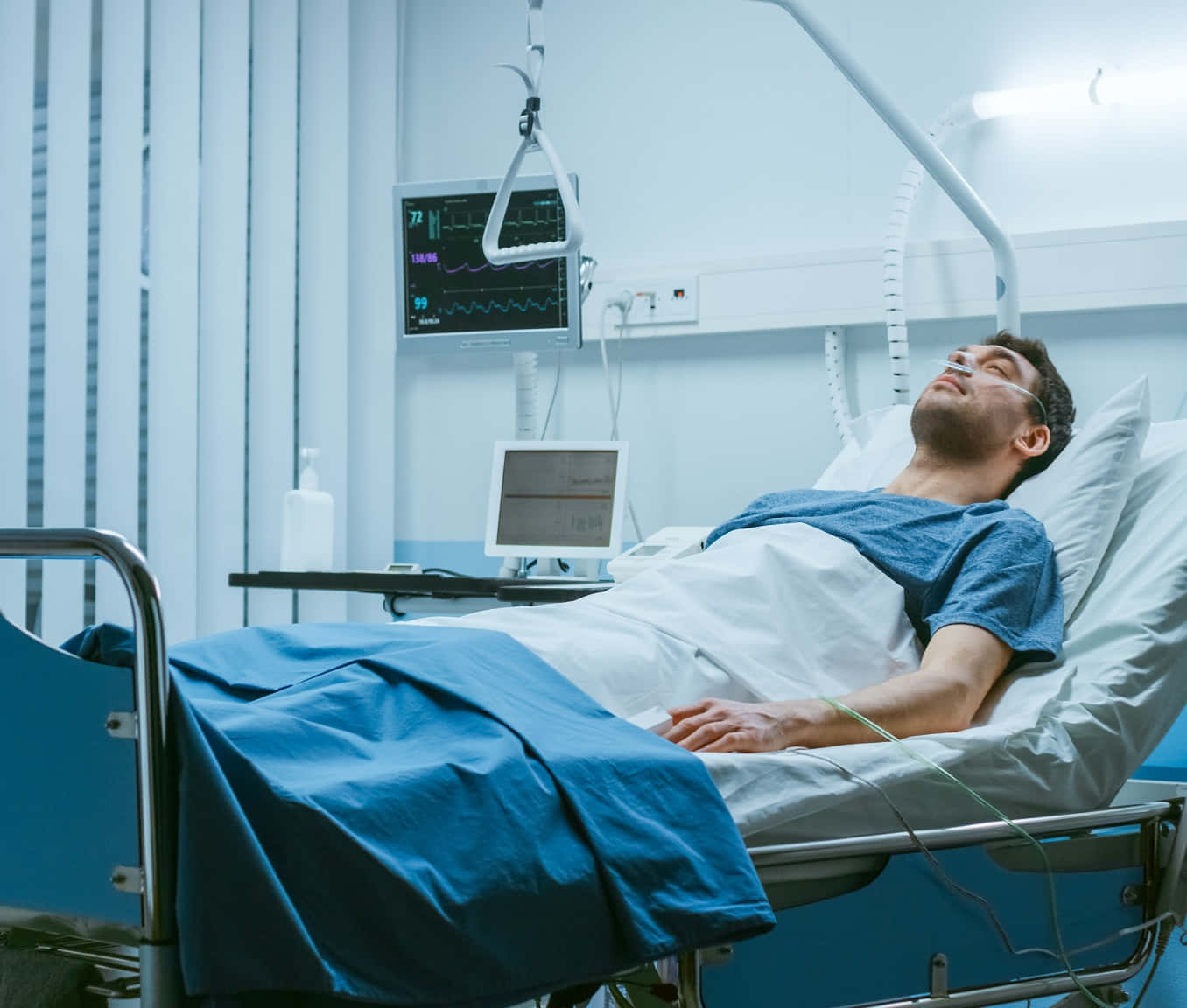 Peaceful Male Patient Resting On Hospital Bed