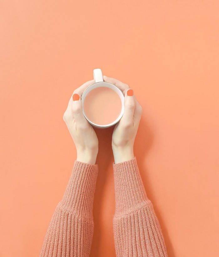 Peach Color Aesthetic Drink In White Mug Background