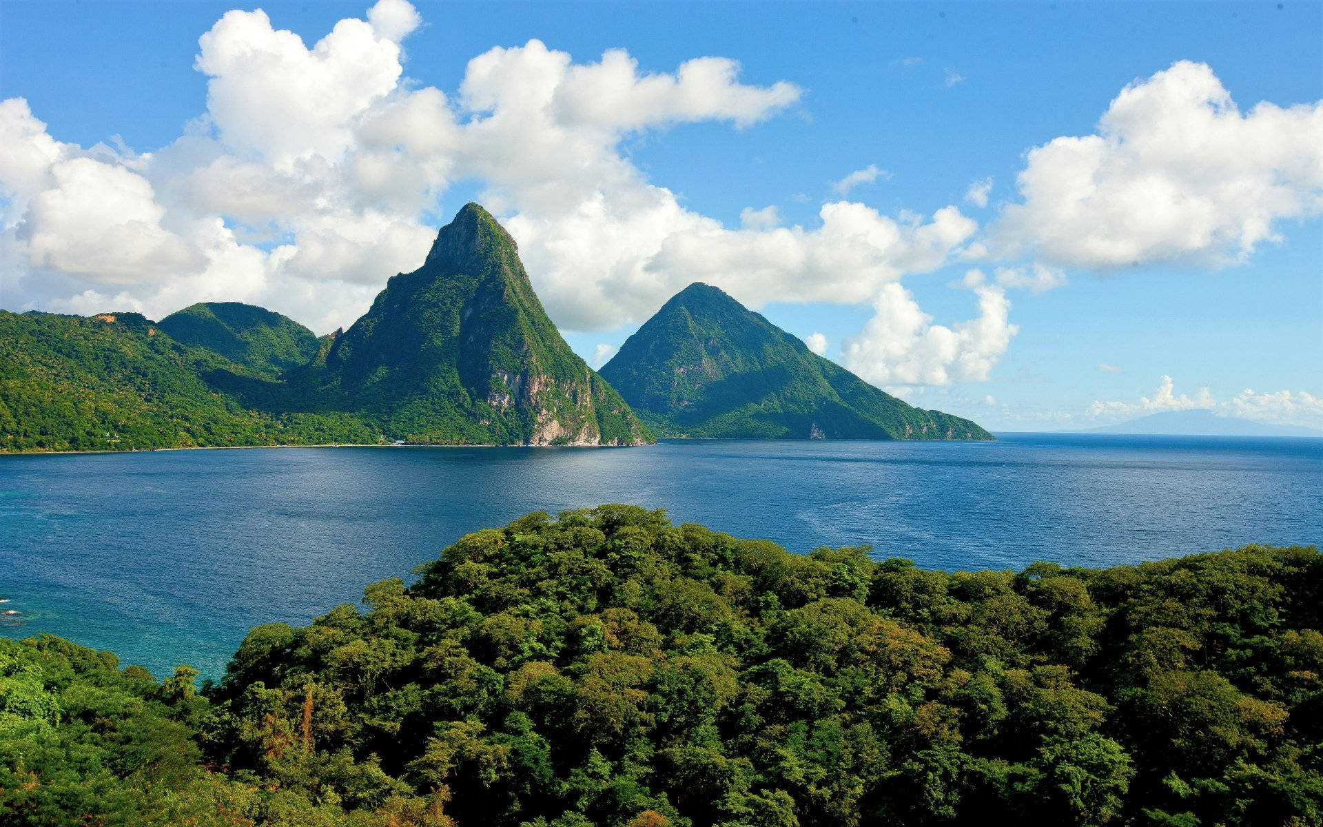 Peaks Reaching Clouds In St Lucia Background