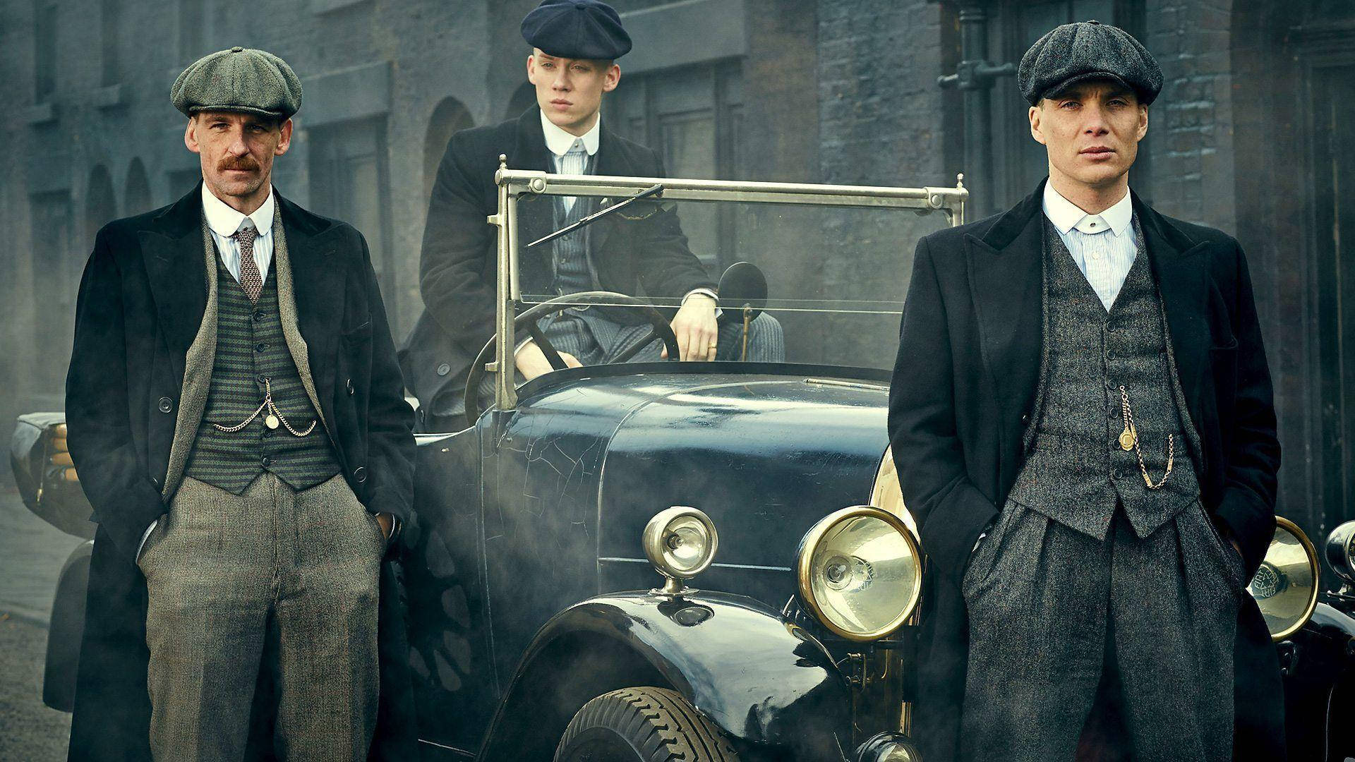 Peaky Blinders Men And Vintage Car Background