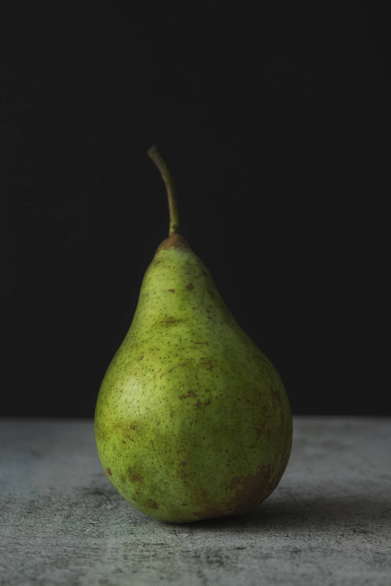 Pear Fruit On Concrete Surface Background