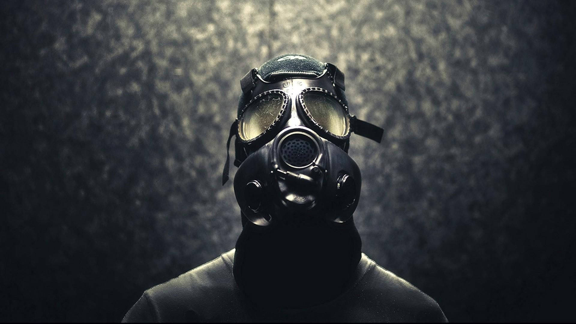 Peculiar Man In Full Gas Mask Background