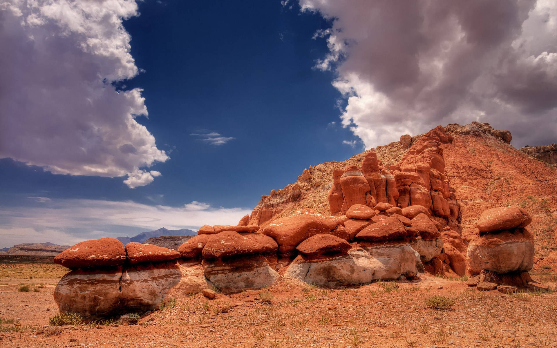 Pedestal Rocks In Desert Background