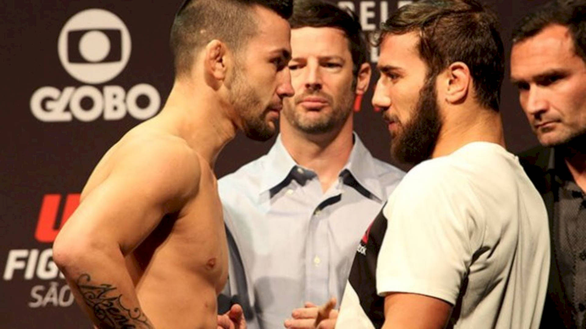 Pedro Munhoz Facing Shirt On Opponent Background