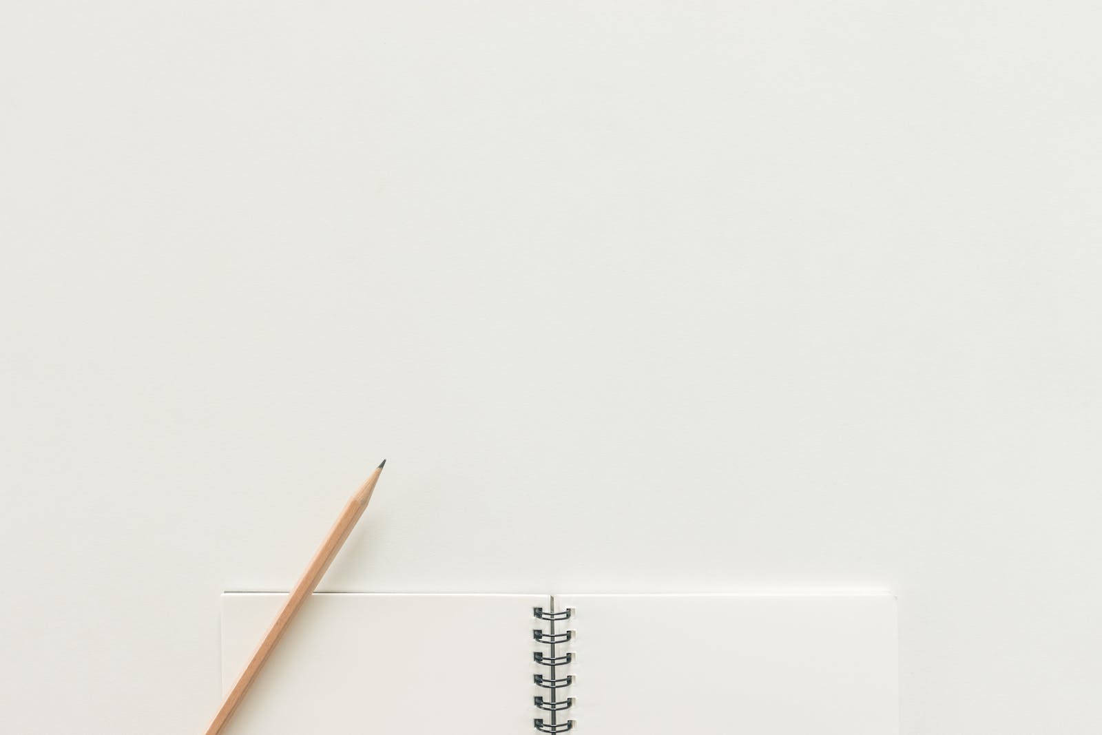 Pencil Notebook With White Paper Texture Background