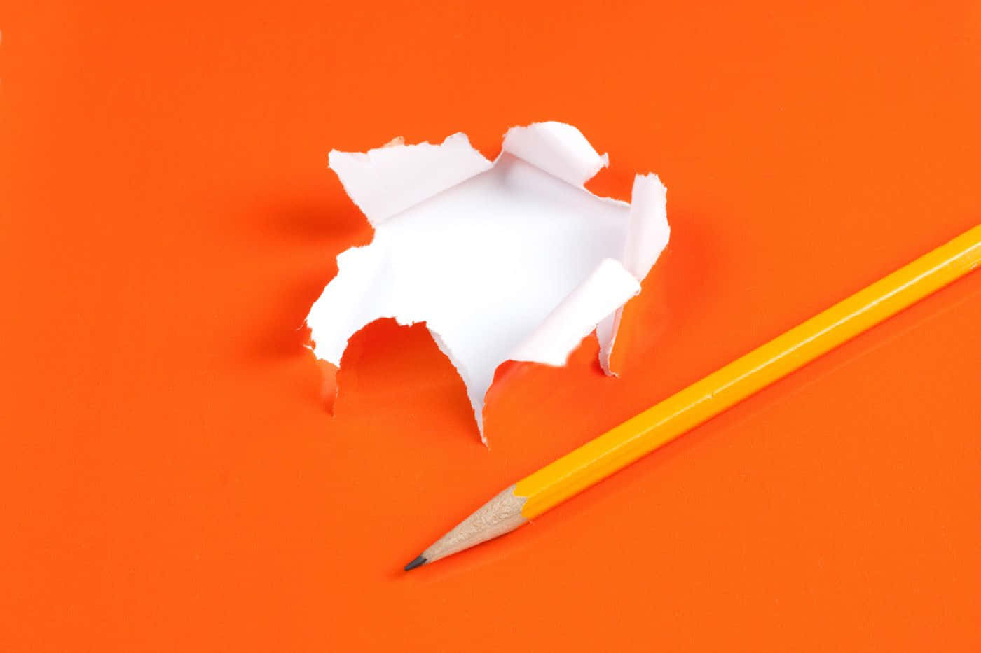 Pencil Orange Hole Torn Paper Background